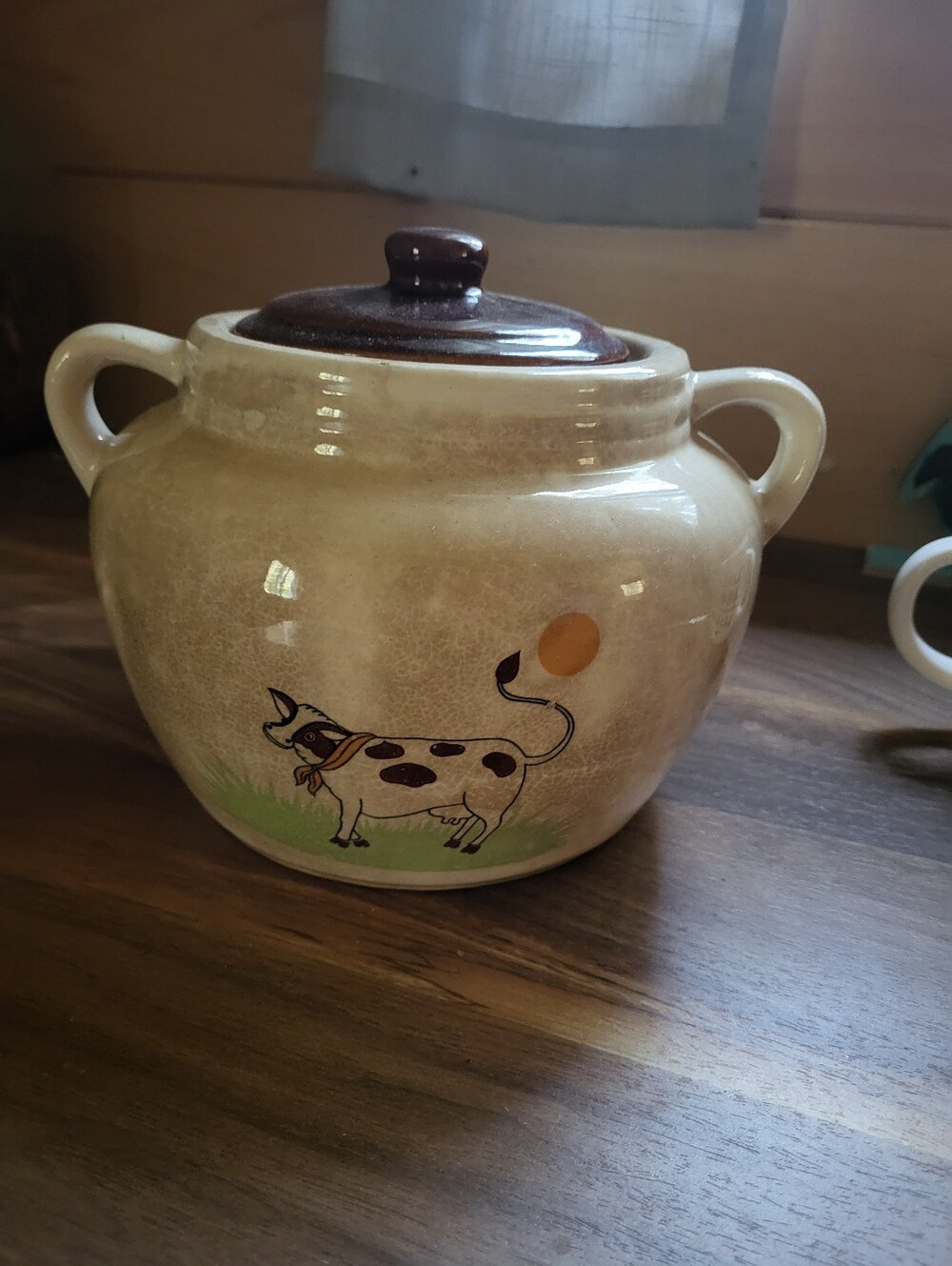Cream Ceramic Cookie Jar with Brown Lid and Cow Motif